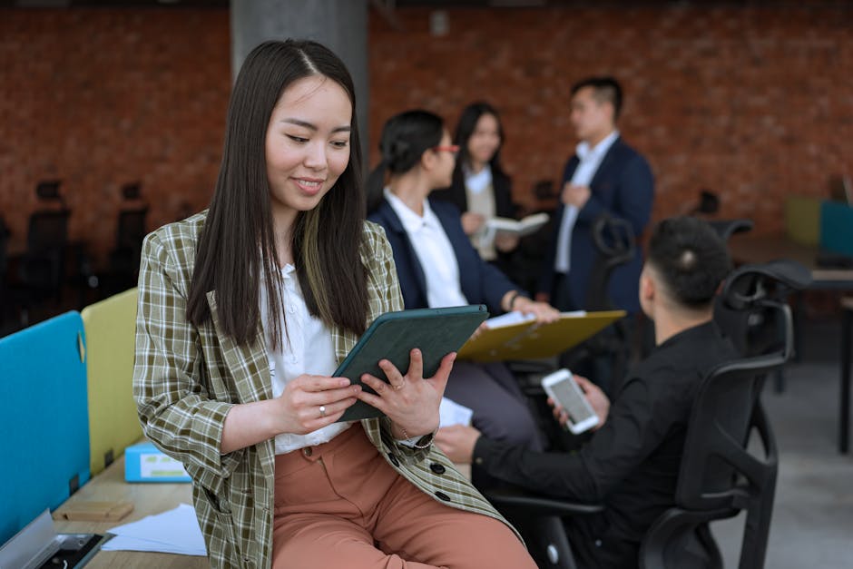 Remote workers chatting casually inside a bright coworking space