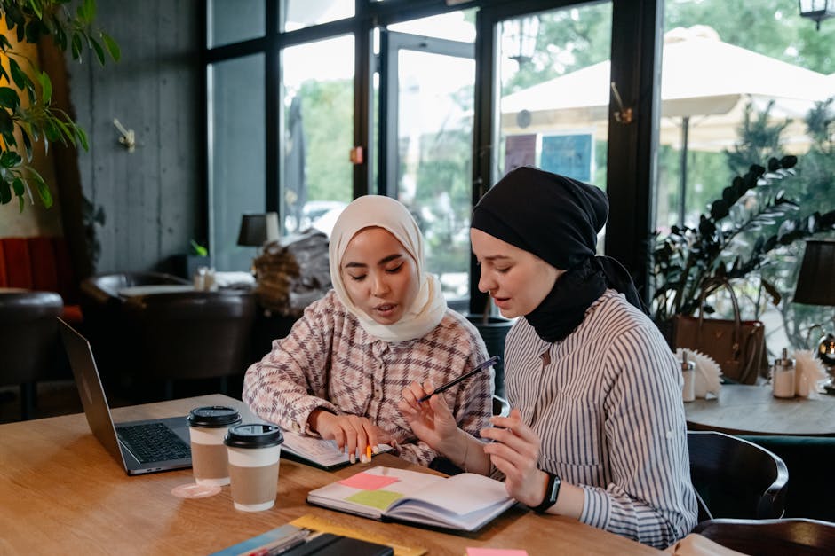 Young woman planning quietly in a coffee shop before meeting people
